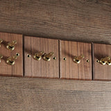 RetroLux Zwart Walnoot 1–4 Gang Wandschakelaar met Messing Toggle